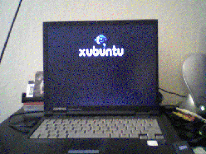 Picture of laptop powered on showing xubuntu boot screen