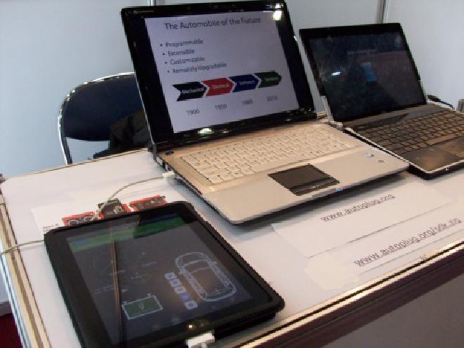 Picture of iPad and laptops setup for demo presentation