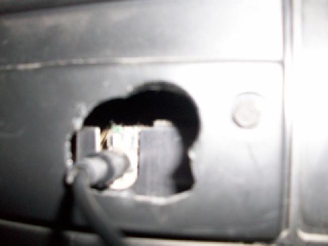 Picture of hole cut out of the back of the TV