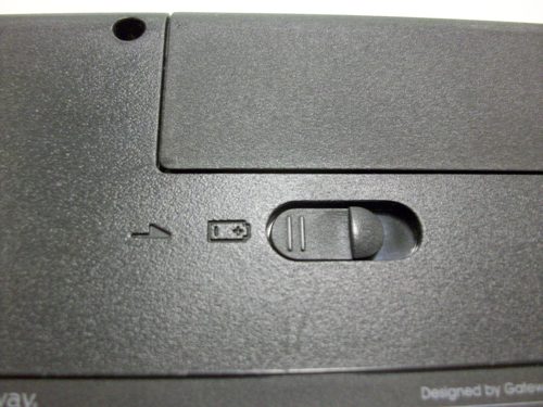 Picture of battery release switch on bottom of laptop