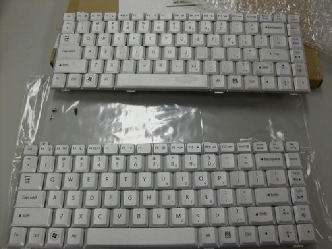 Picture of old and new keyboards next to each other