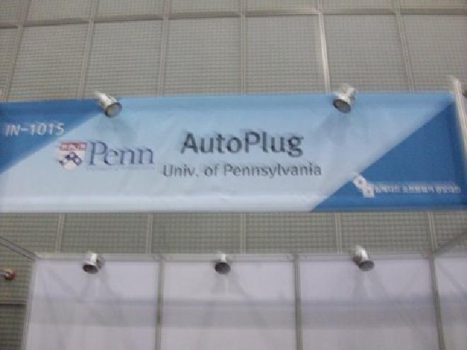 Picture of our sign above our booth for the competition